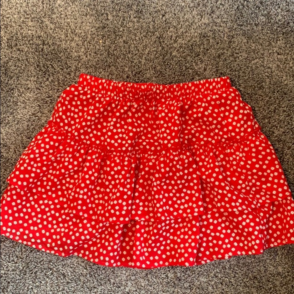 red floral skirt